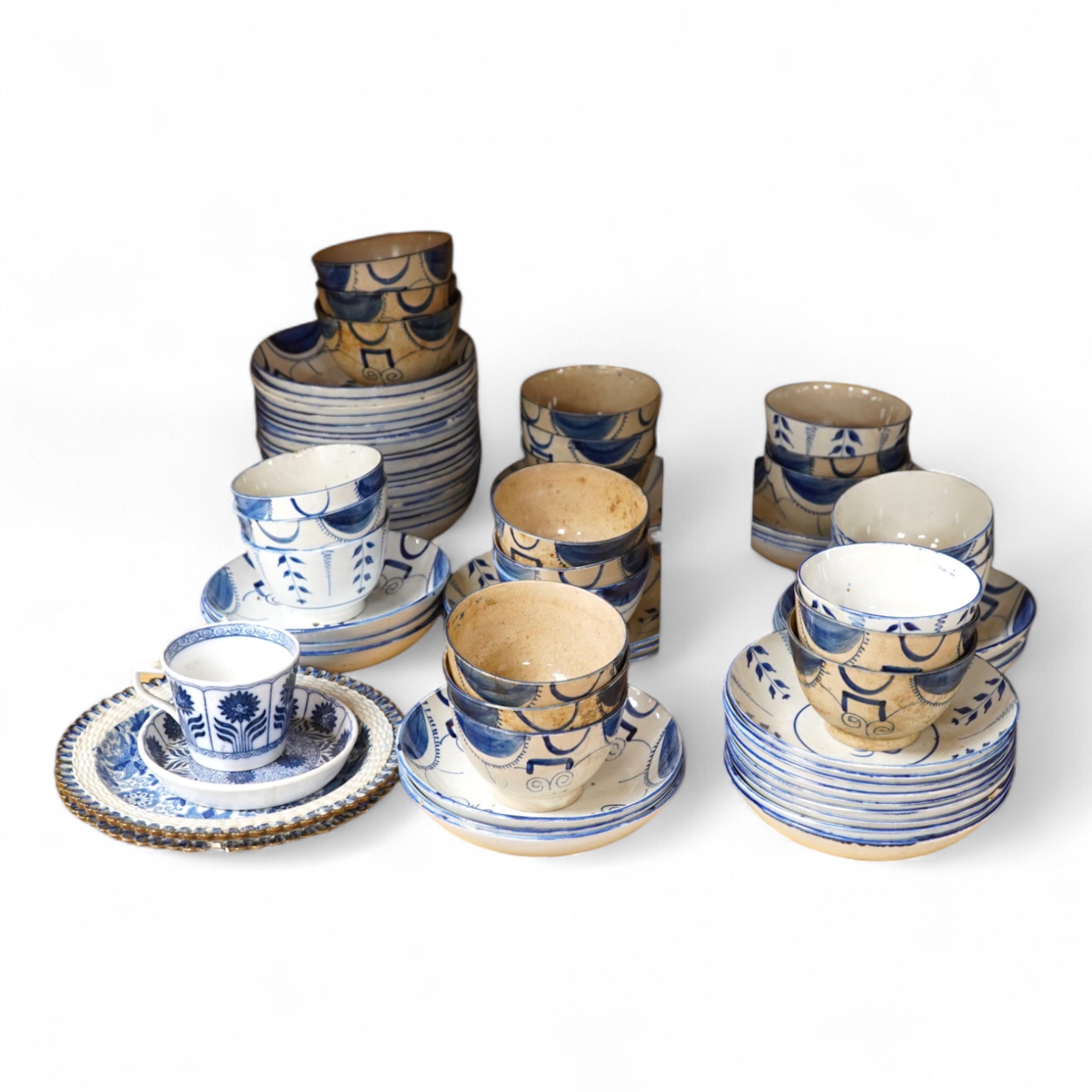 A group of 19th century pearlware set of tea bowls and saucers and to similar basket with border plates
